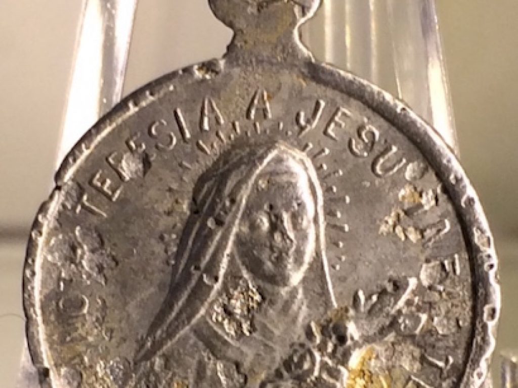 An aluminium Sanctify pendant (front)